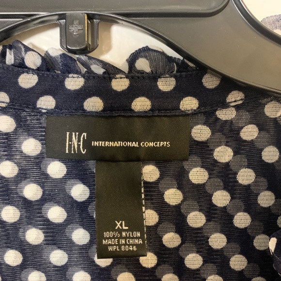 INC    XL. Fits snug.  I’d say fits like a large. - Picture 2 of 4